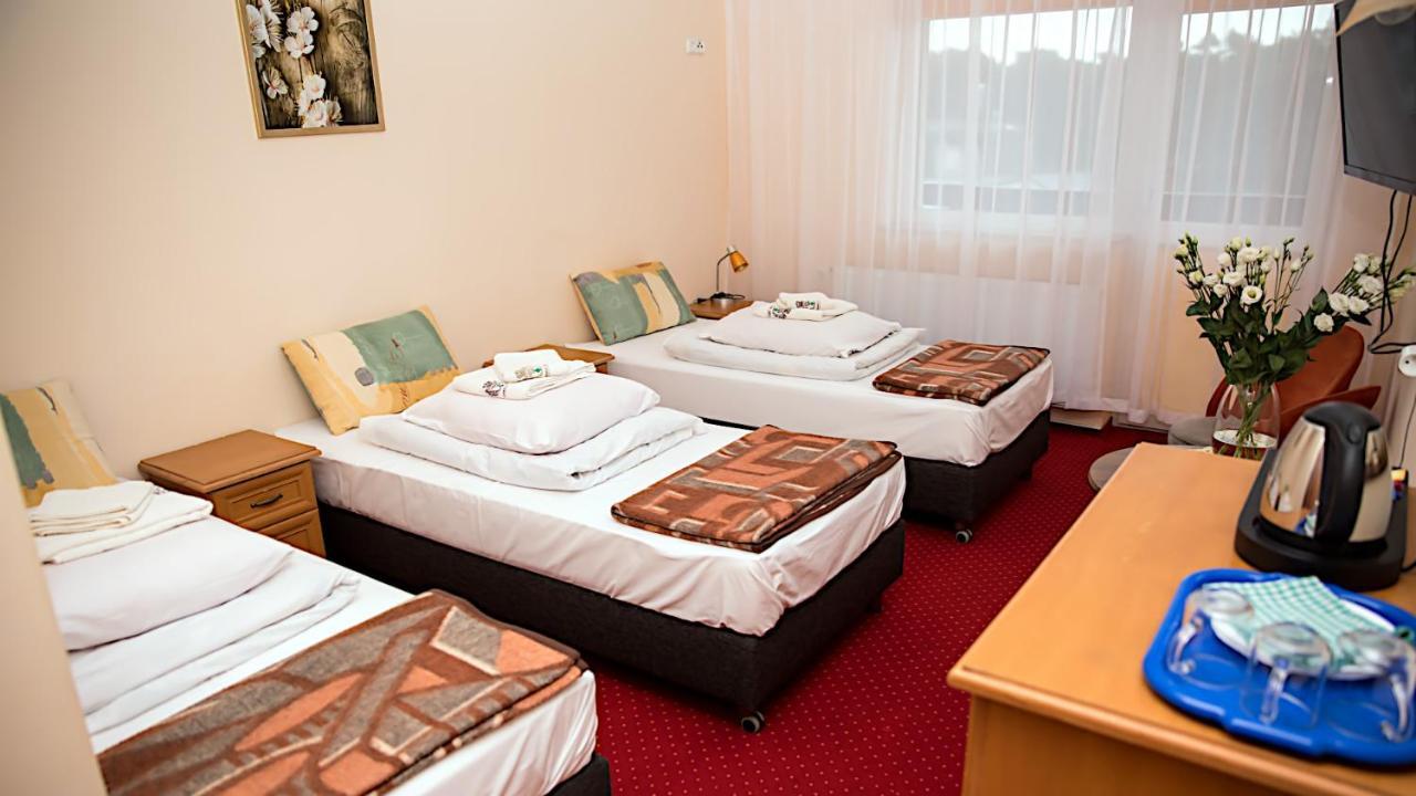 Отель Osrodek Wypoczynkowo Rehabilitacyjny Wlokniarz Устка Экстерьер фото